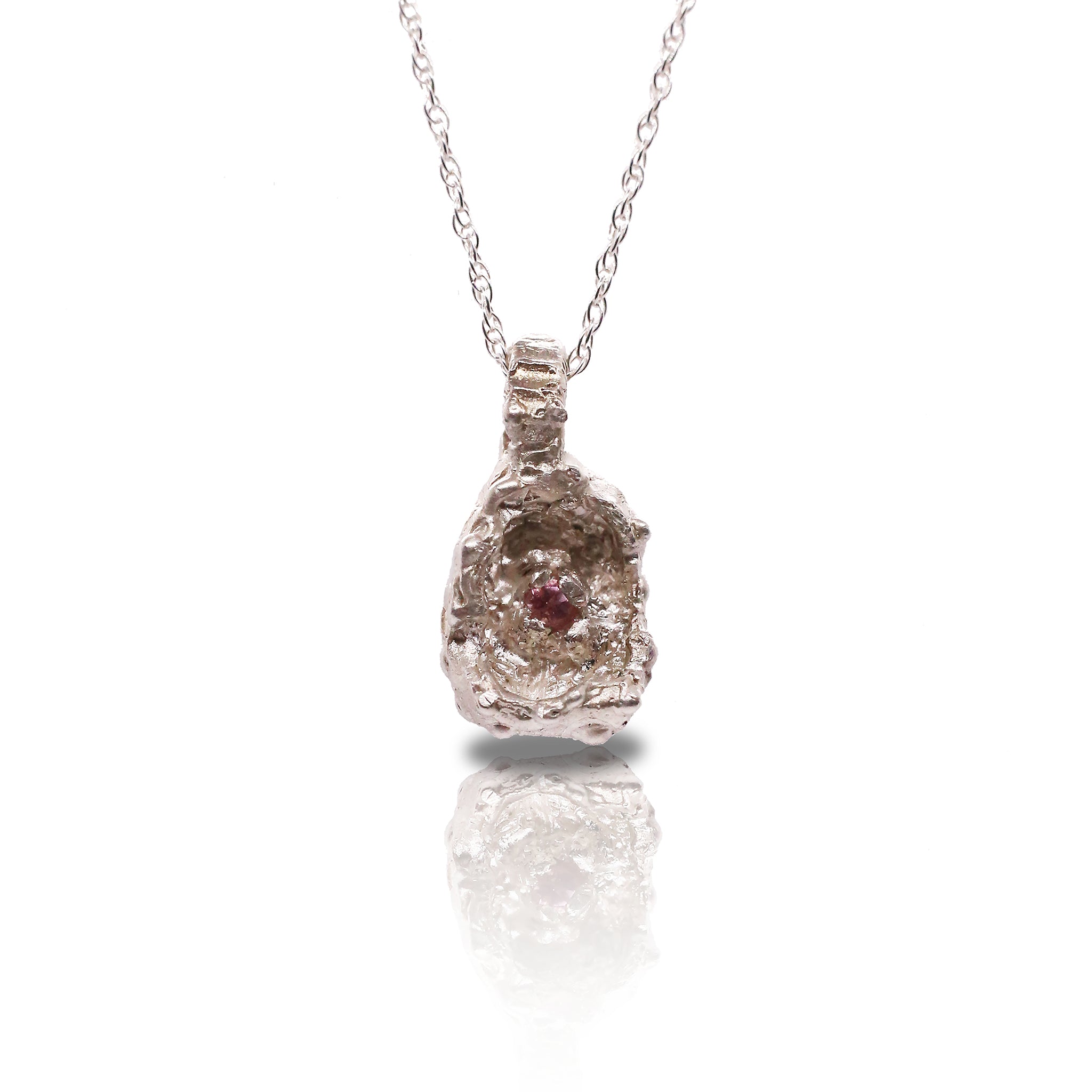 The Arched Sunken Pink Tourmaline Amulet